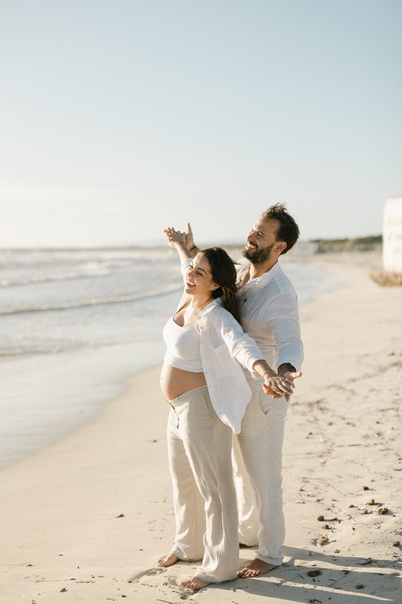 Photographe grossesse couple plage Fribourg – Iryna Pinho